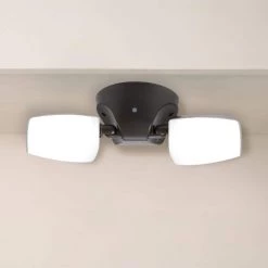 Commercial Electric Variable CCT 2000 Lumens Twin Head Bronze Outdoor Integrated LED Floodlight with Integrated Photocontrol -Commercial Electric Sales bronze commercial electric flood lights ft28vcibce 4f 1000